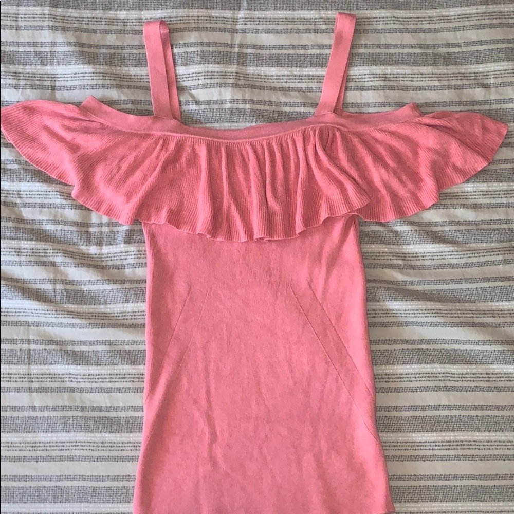 Peach colored open shoulder top
